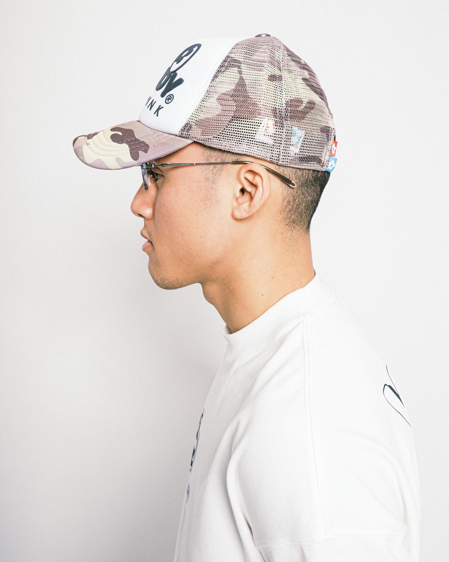 VANDYTHEPINK - Eye Logo Trucker Hat - Yellow Camo