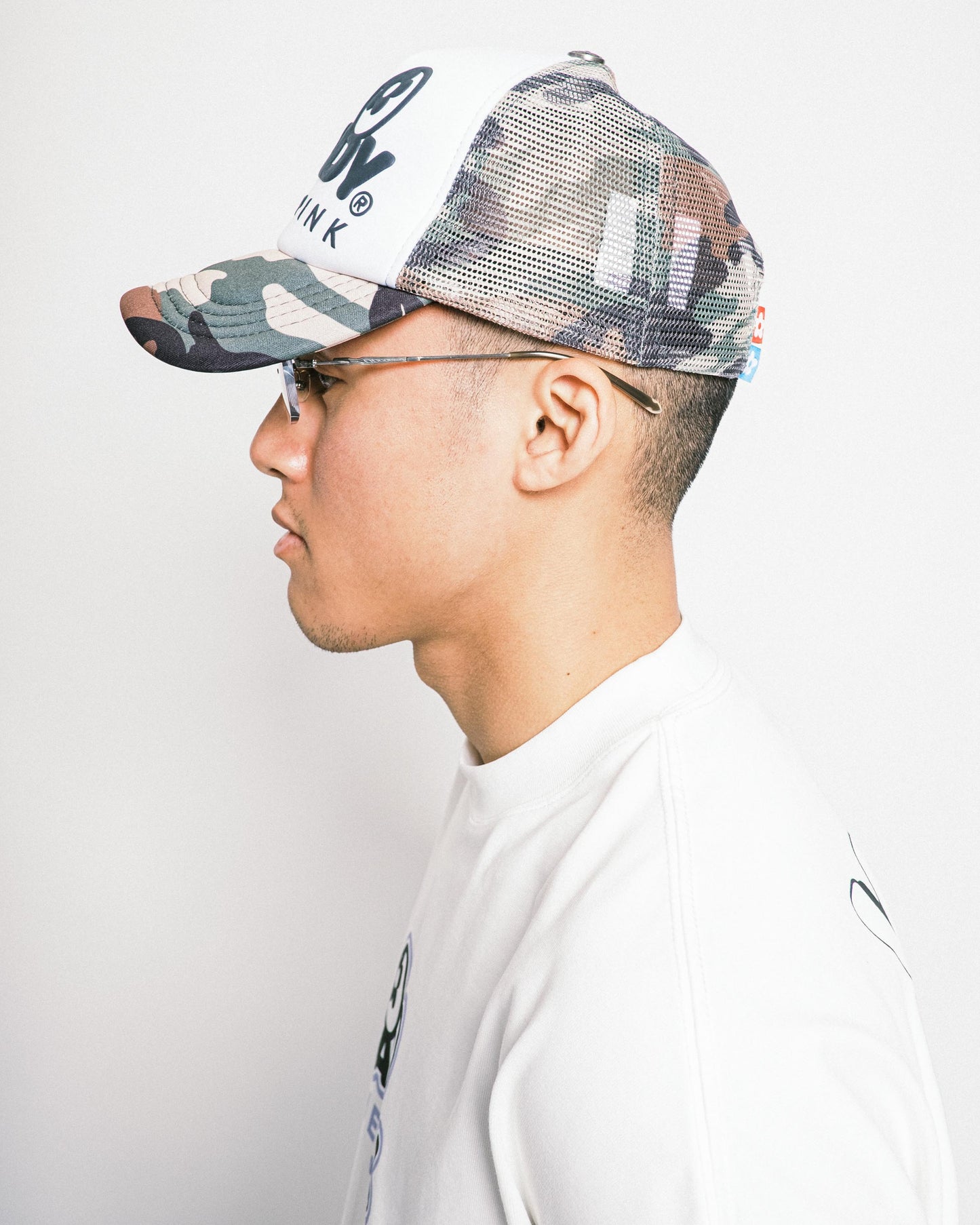VANDYTHEPINK - Eye Logo Trucker Hat - Green Camo